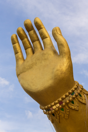 Hand of Golden statue of Ganeshaの写真素材