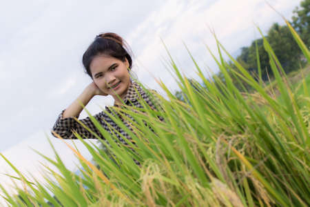 Woman farmer in Green Cornfieldの写真素材