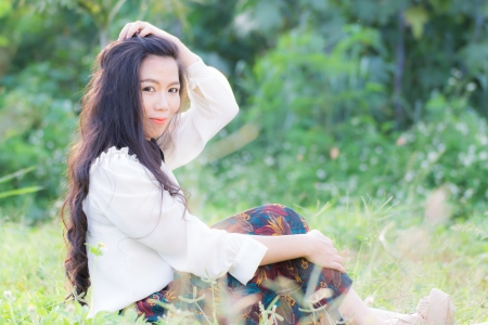 Profile of a young Asian womanの写真素材