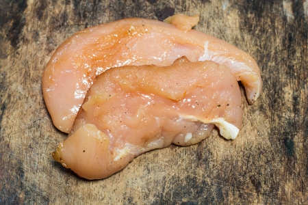 Marinated chicken on Butcherの写真素材