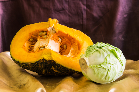 still life split pumpkin and cabbageの写真素材