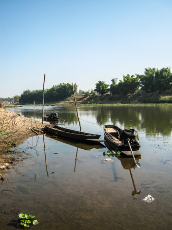 Fishing boat in Riverの写真素材