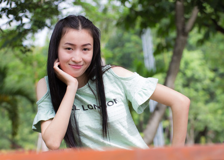Portrait asian woman outdoorsの写真素材
