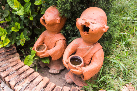 Cute Doll clay monk in the templeの写真素材