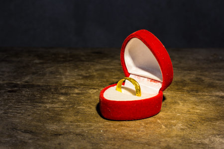 still life with golden ring in box