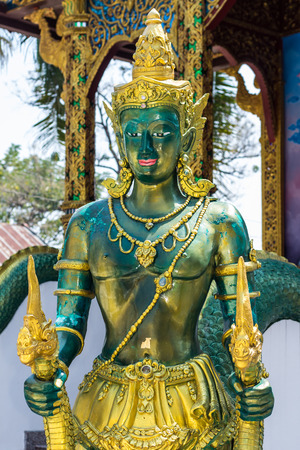 angel statue in thai templeの写真素材