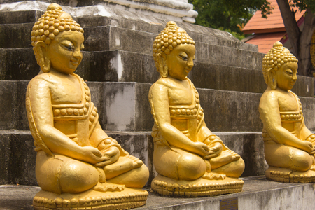 old thai golden buddha statue in wat kamae, chomthong chiangmai Thailandの写真素材