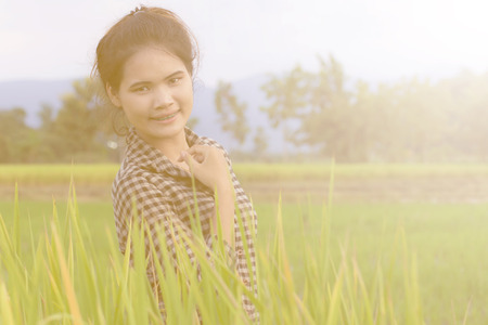 Woman farmer in Green Cornfieldの写真素材