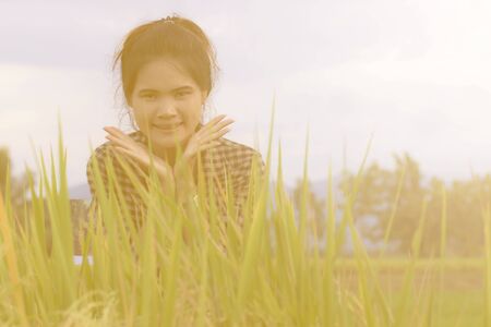Woman farmer in Green Cornfieldの写真素材