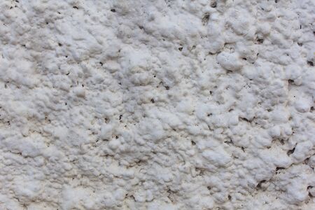 White rough concrete wall backgroundの写真素材