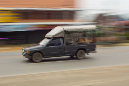 pick-up Speeding in road, panning camera, Thailand asiaの写真素材