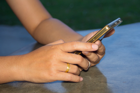 Hand with samrt phoneの写真素材