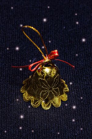 bell on black with snow fabric christmasの写真素材