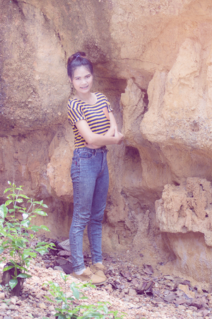 Thai Woman portrait standing near Cliffの写真素材