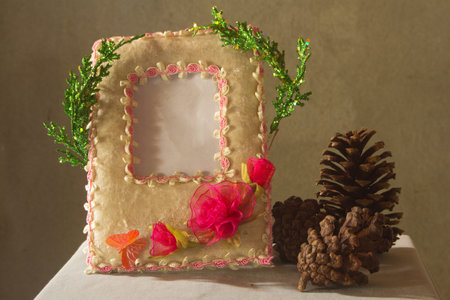 Peper picture frame with Pine cones and tree chrismas still life