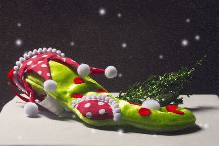 Green Sock chrismas tree with snow still lifeの写真素材