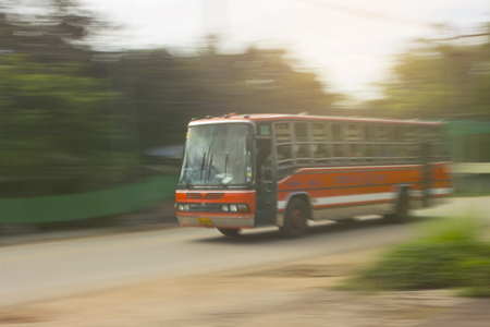 Thai   bus panning in roadの写真素材