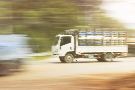 truck panning camera in roadの写真素材