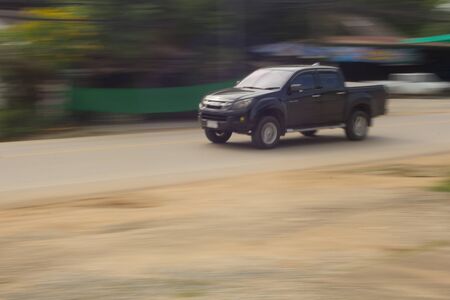 pick-up Speeding in road, panning camera, Thailand asiaの写真素材