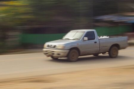 pick-up Speeding in road, panning camera, Thailand asiaの写真素材