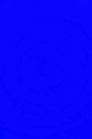 Beautiful blue yellow smooth spiral circles backgroundの写真素材