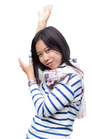 Happy young asian woman hands up isolated on whiteの写真素材
