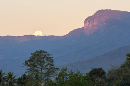 Full moon with Doi Hua Sua Mountain Chomthong, Chiangmai Thailandの写真素材