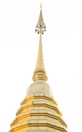 Golden pagoda in thai temple isolated on whiteの写真素材