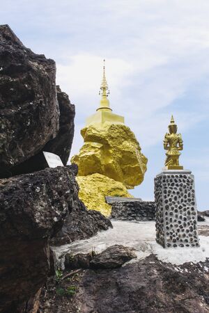 Golden statue in Lamphun Thailandの写真素材