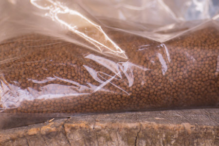 Fish food in plastic bagの写真素材