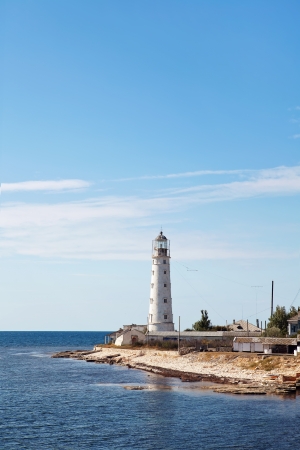 lighthouse on the coast of the seaの写真素材