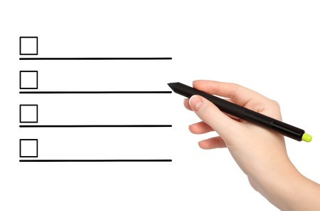 isolated female hand with pencil draws somethingの写真素材