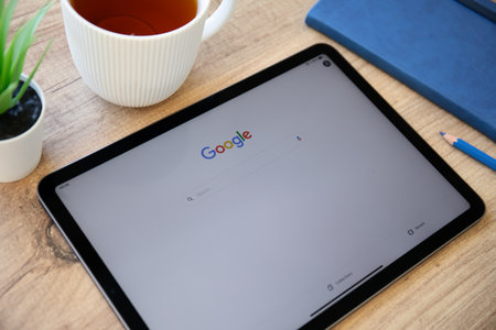 Alanya, Turkey - September 26, 2022: Apple iPad Air Space Gray with social networking service Google on the screen.のeditorial素材