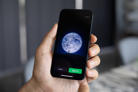 Alanya, Turkey - October 24, 2023: Man hand holding iPhone 14 with social networking service messenger WeChat on the screen.のeditorial素材