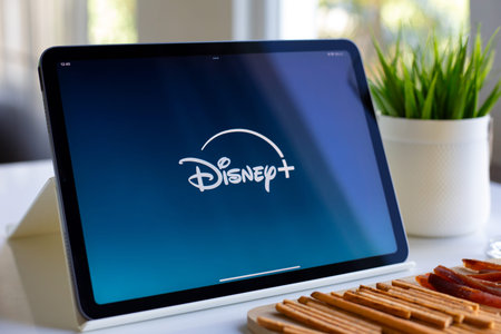 Alanya, Turkey - May 3, 2024: Tablet Apple iPad Air with multinational entertainment company Disney...