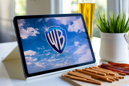 Alanya, Turkey - May 3, 2024: Tablet Apple iPad Air with multinational entertainment company Warner Bros provides streaming media and video on the screen.のeditorial素材