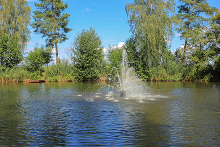 Lake and fountainの写真素材