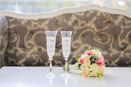 Wedding Bouquet and champagne glassesの写真素材