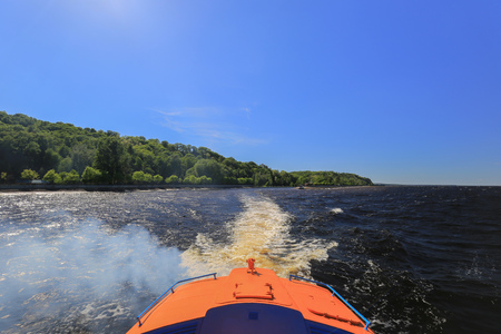 Water traces of speed boat hydrofoil on water surfaceの写真素材