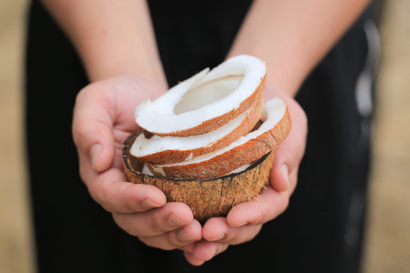 Coconut pulp in the hands