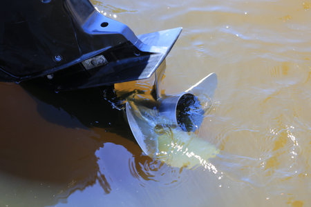Motor boat screw close up. Engine propeller