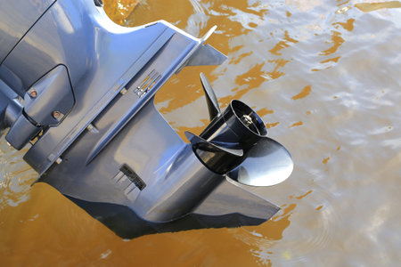 Motor boat screw close up. Engine propeller