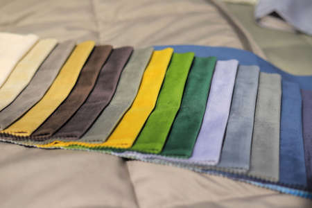 Palette of colored fabrics close up on the sofaの写真素材