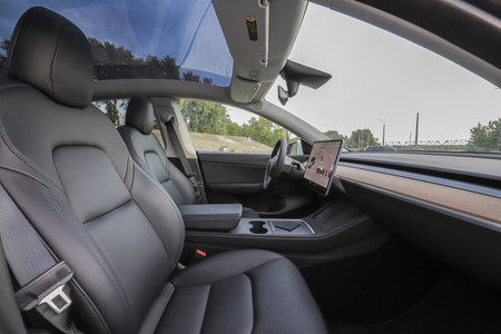 Kyiv, Ukraine - 29 september, 2022: Driver's seat of the interior car Tesla Model Yのeditorial素材