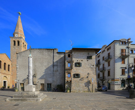 Grado, Italy - 20 July, 2019: Croce del Patriarcato Gradese in old town square in Grado cityのeditorial素材