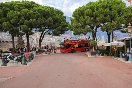Monaco - July 23, 2019: Red double-decker tourist bus on the street of Monacoのeditorial素材