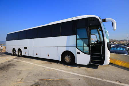 Big white passenger bus in the parking lotの写真素材