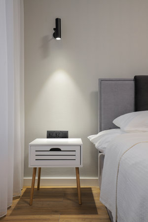 Bedside table in the modern bedroom interiorの写真素材