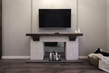 Modern TV hanging on the wall in the living roomの写真素材