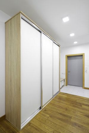 White sliding wardrobe in the hallway near the front doorの写真素材